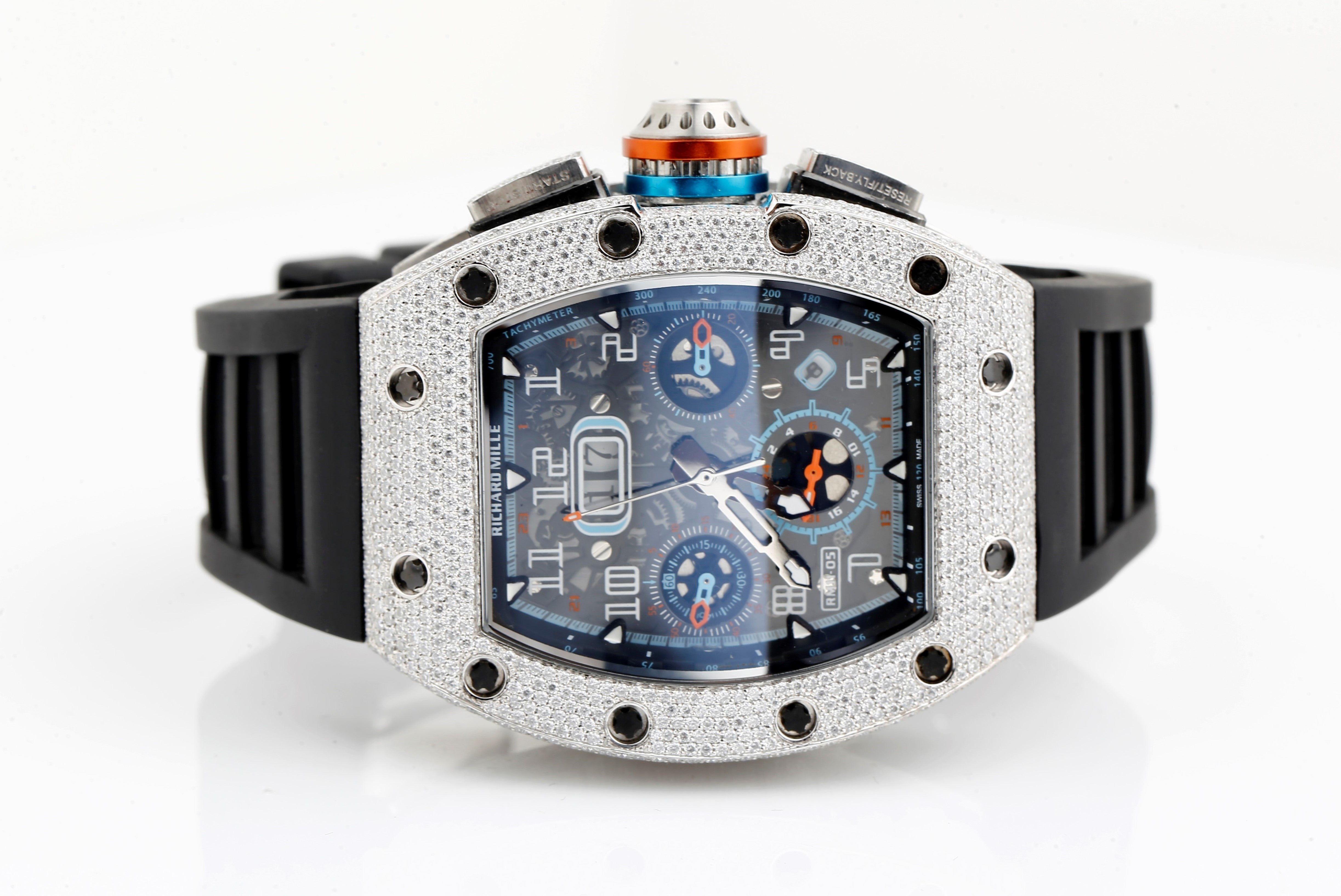 Luxury watch with a detailed face and diamond-studded case on a white background